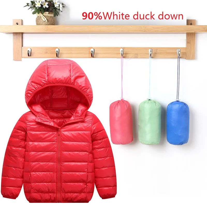 I begyndelsen af vinteren, nye børn, som er let varm dunjakke dreng pige baby hætteklædte let at folde hvid duck ned børns jakke