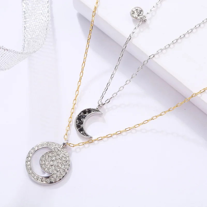 Fashion smykker i høj kvalitet swa, charmerende og romantisk sort og hvid moon dobbelt-lag kæde kvindelige passer til kravebenet kæde