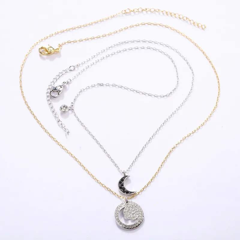 Fashion smykker i høj kvalitet swa, charmerende og romantisk sort og hvid moon dobbelt-lag kæde kvindelige passer til kravebenet kæde