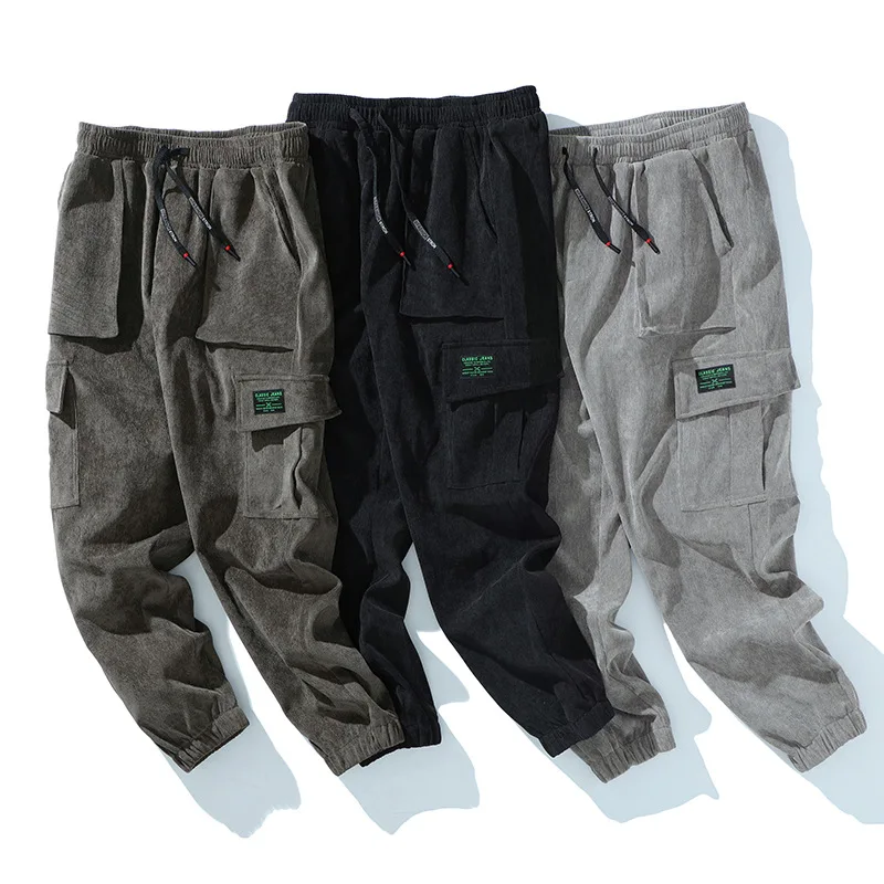 2020 Efterår og vinter nye fløjlsbukser casual bukser til mænd Japan tendens multi-lomme overalls mode i stor størrelse label herrebukser
